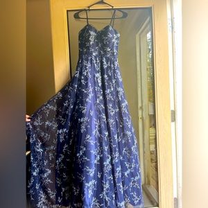 Beautiful blue prom/homecoming dress. Lightweight staples,has pockets!